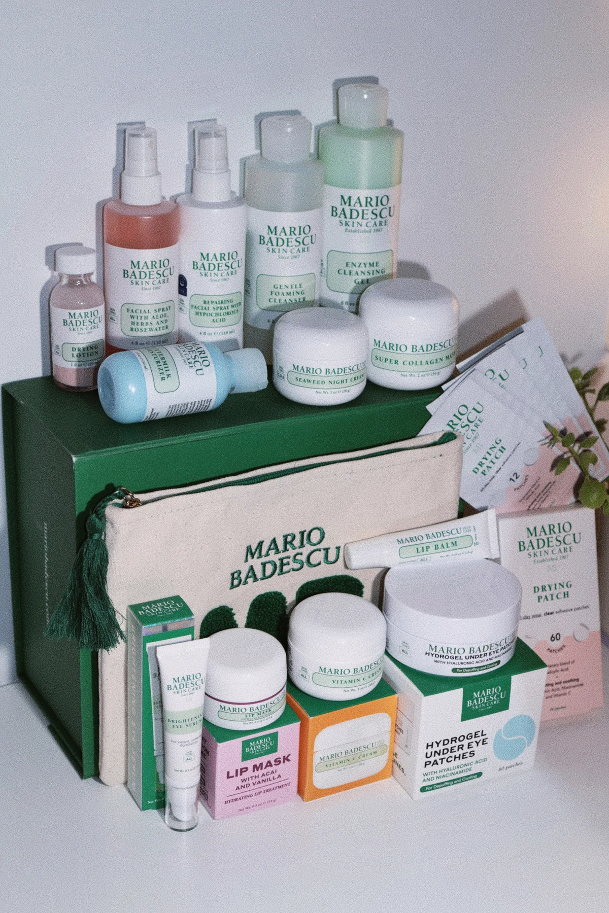 Mario Badescu skincare collection arranged with branded packaging