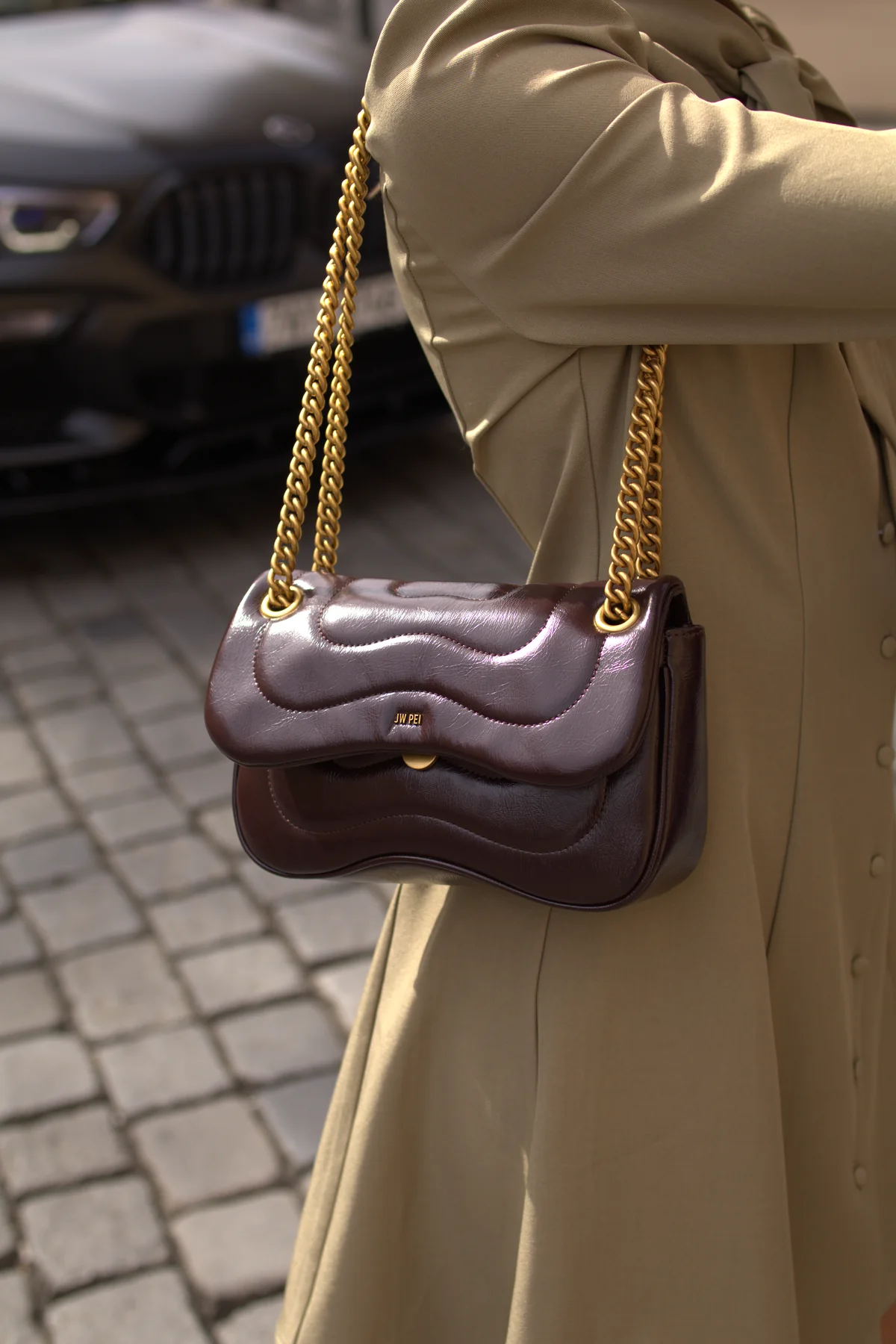 Quilted handbag styled with a neutral fashion look